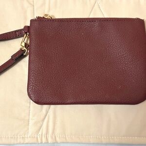 Beautiful Steve Madden wristlet. Dark burgundy/brown. Black interior. Gold hrdwr